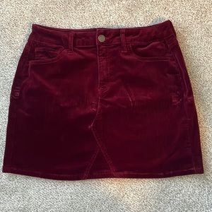 Burgundy corduroy mini skirt. Size 13 juniors.